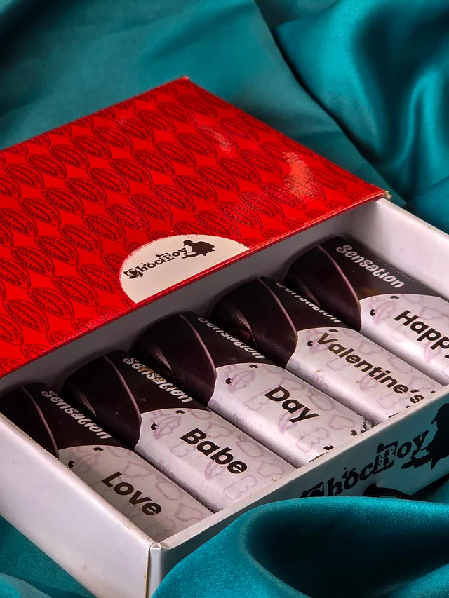 Personalised ChocBoy gift box photographed on teal fabric